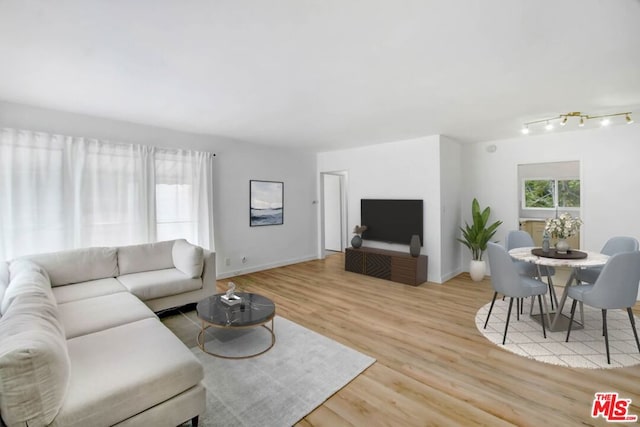 living room with light hardwood / wood-style floors