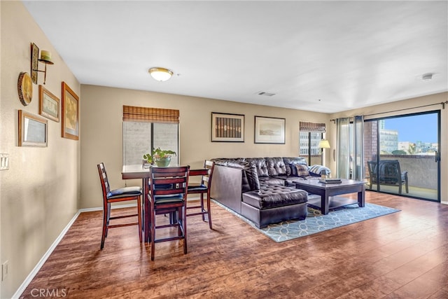 living room with wood-type flooring