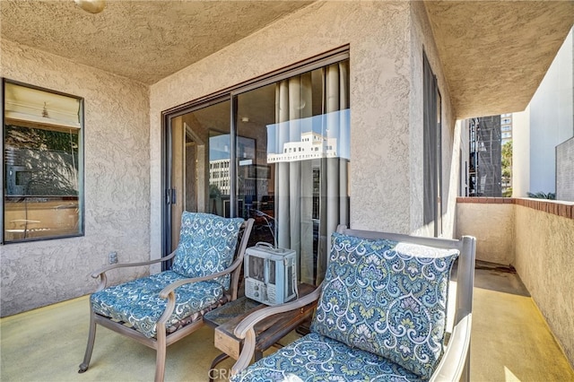 view of patio / terrace with a balcony