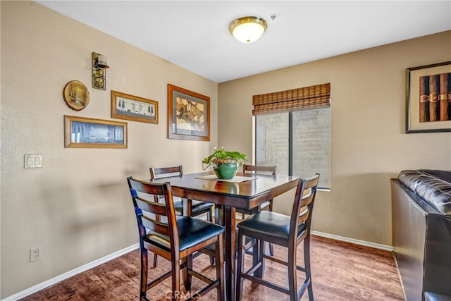 dining room featuring hardwood / wood-style floors