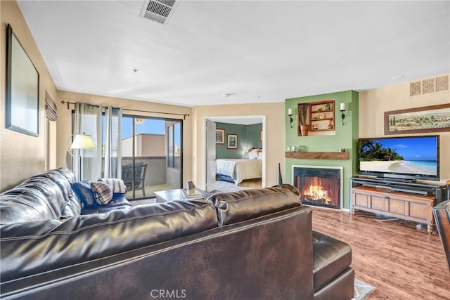 living room featuring light wood-type flooring