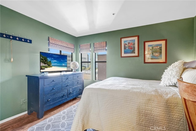 bedroom featuring hardwood / wood-style floors