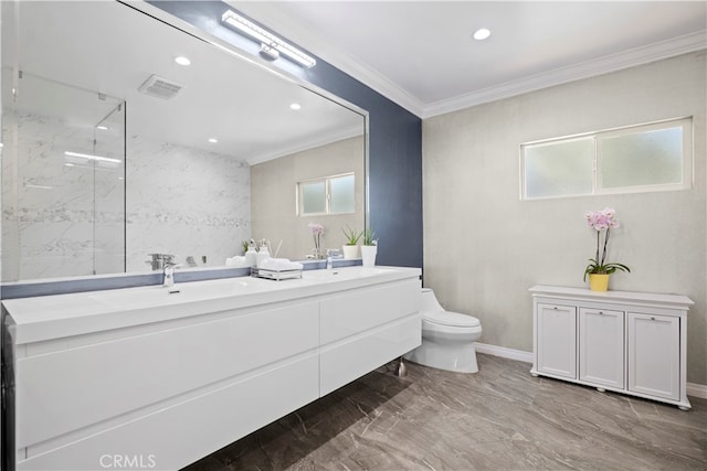 bathroom featuring vanity, crown molding, tiled shower, and toilet