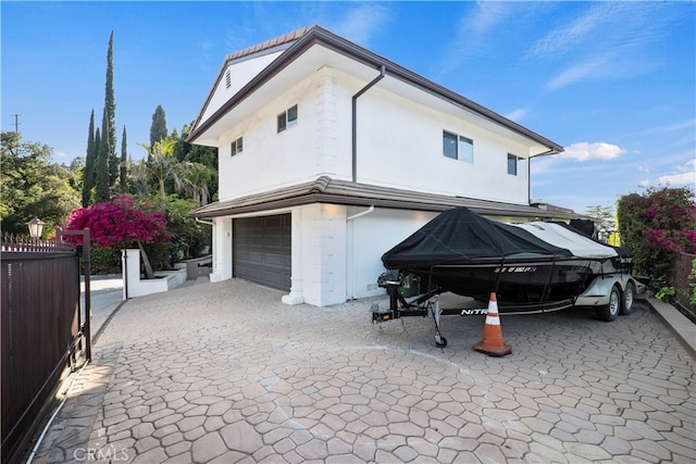 view of home's exterior featuring a garage