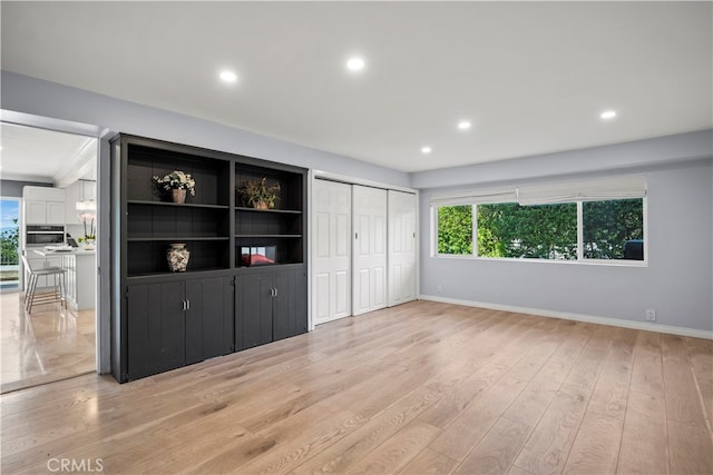 unfurnished bedroom featuring light hardwood / wood-style flooring