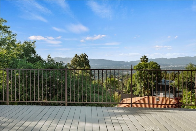 wooden terrace with a mountain view