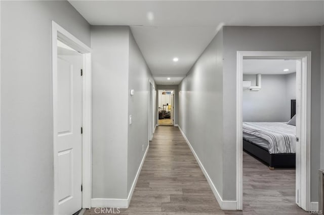 corridor featuring light wood-type flooring