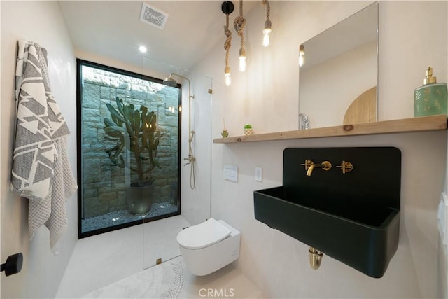 bathroom with tile patterned flooring, toilet, and sink