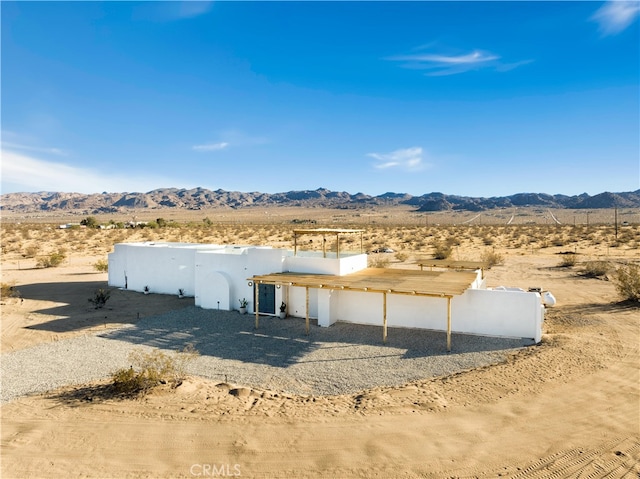 view of outdoor structure with a mountain view