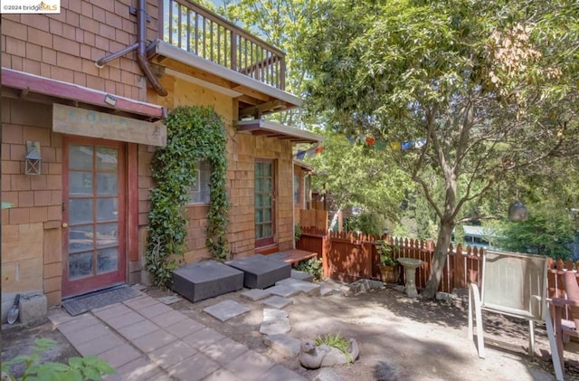 view of patio / terrace with a balcony