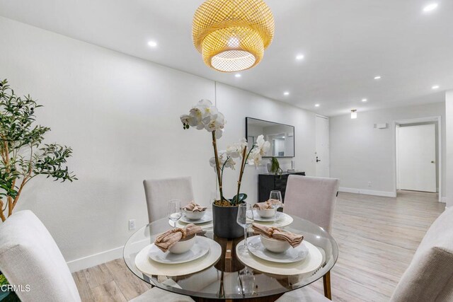 dining space featuring light hardwood / wood-style floors