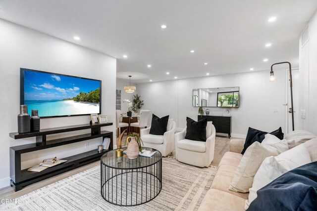 living room featuring light wood-type flooring