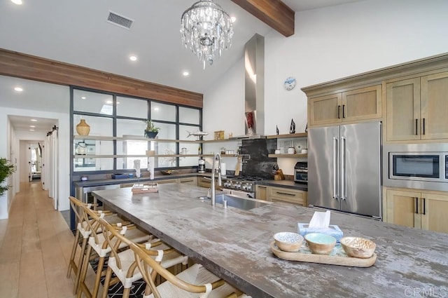 51 Catspaw, Coronado, CA 92118 - kitchen featuring high vaulted ceiling, visible vents, dark stone counters, beam ceiling, and premium appliances