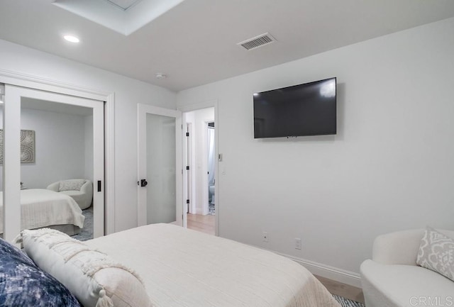 51 Catspaw, Coronado, CA 92118 - bedroom with a closet, wood finished floors, baseboards, visible vents, and recessed lighting