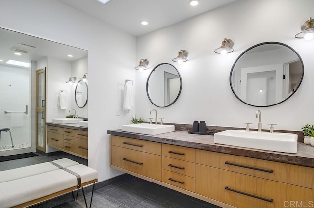 51 Catspaw, Coronado, CA 92118 - full bathroom with double vanity, a sink, and recessed lighting
