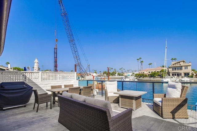 51 Catspaw, Coronado, CA 92118 - view of patio / terrace featuring a community pool, area for grilling, a water view, and an outdoor living space