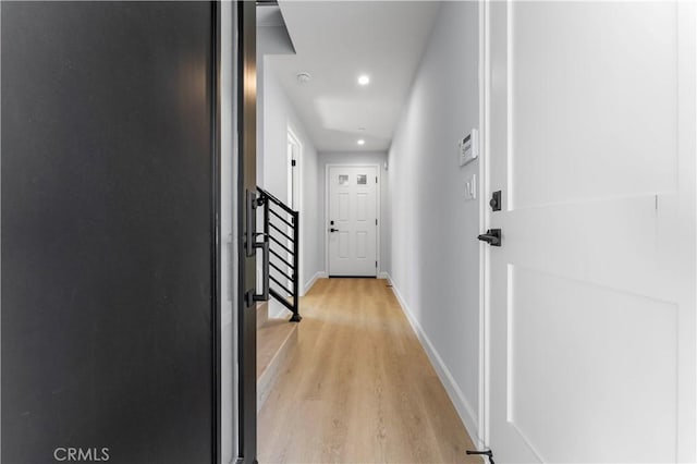 corridor featuring light hardwood / wood-style flooring