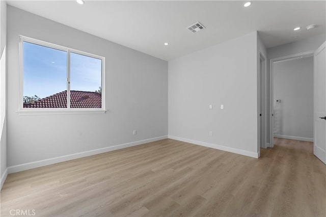 empty room featuring light hardwood / wood-style floors