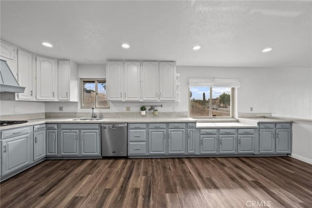 kitchen featuring gray cabinetry, dishwasher, and dark hardwood / wood-style floors