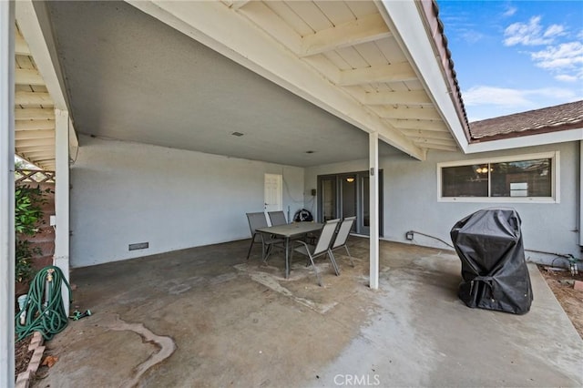 view of patio with a grill