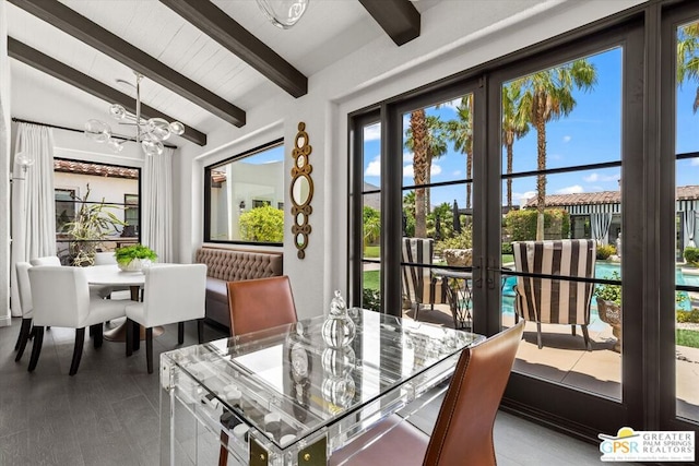 dining area featuring wood ceiling, lofted ceiling with beams, and a notable chandelier