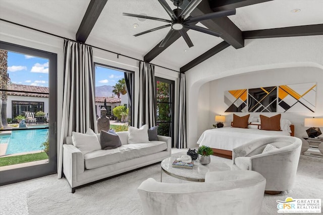 carpeted bedroom with ceiling fan and lofted ceiling with beams