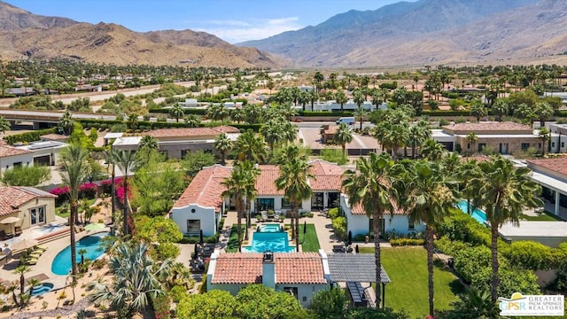 drone / aerial view featuring a mountain view