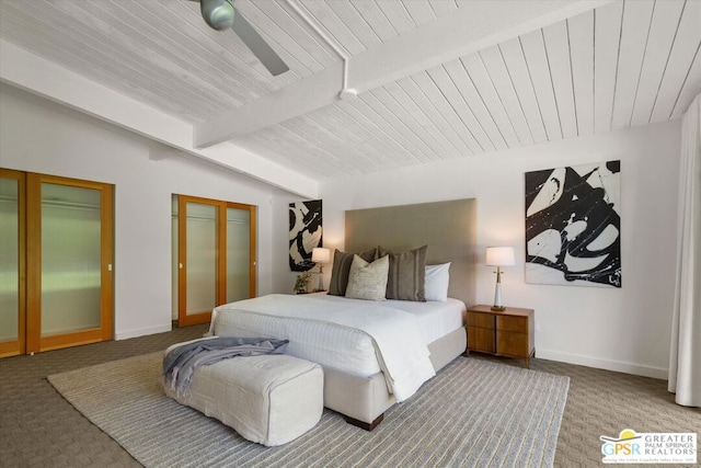 bedroom with ceiling fan, vaulted ceiling with beams, french doors, and carpet floors