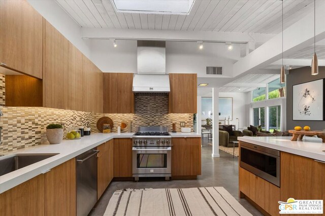 kitchen featuring appliances with stainless steel finishes, backsplash, hanging light fixtures, and beamed ceiling