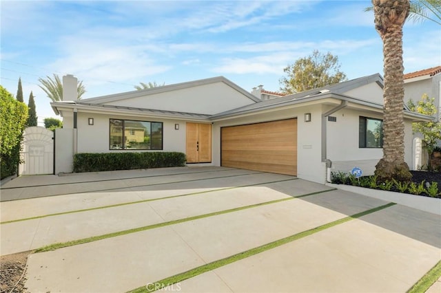 ranch-style home featuring a garage