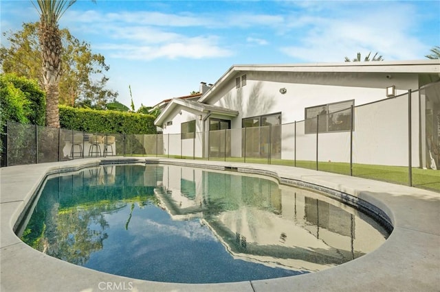 view of pool featuring a patio area