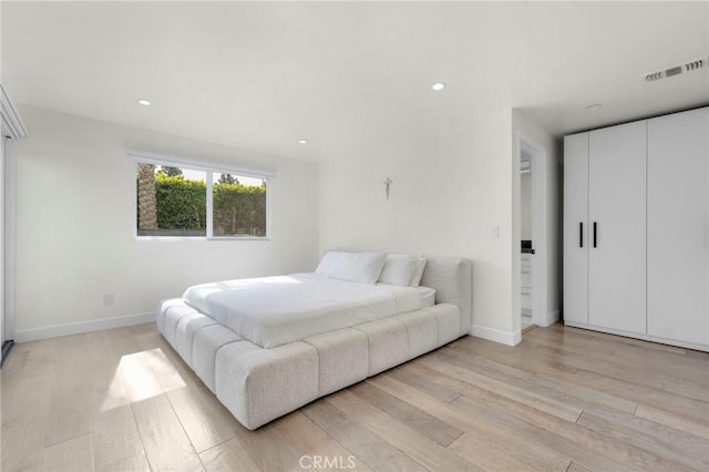 bedroom featuring light hardwood / wood-style flooring