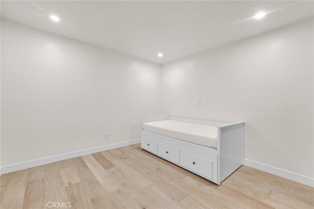 unfurnished bedroom with light hardwood / wood-style floors