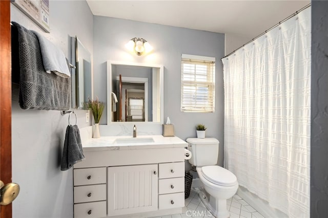 bathroom featuring vanity, toilet, walk in shower, and tile patterned flooring