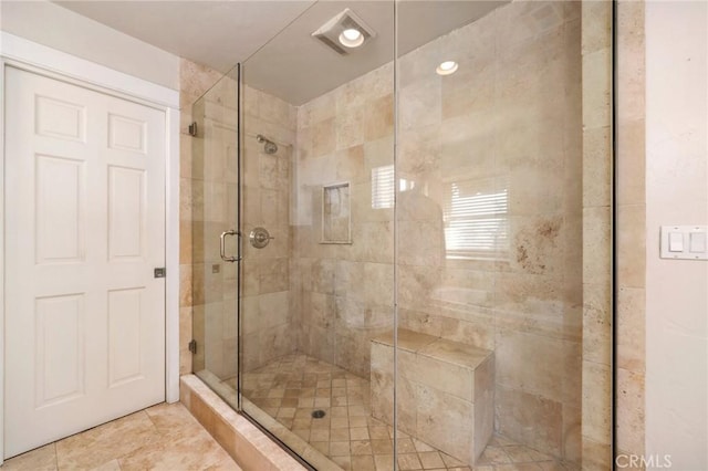 bathroom featuring a shower stall