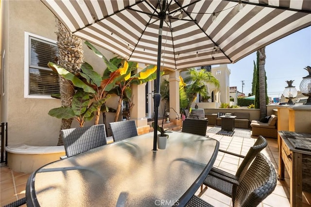 view of patio / terrace featuring an outdoor hangout area and outdoor dining area