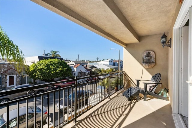 balcony featuring a residential view