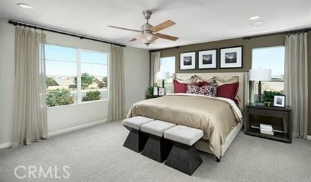 bedroom with ceiling fan and light colored carpet