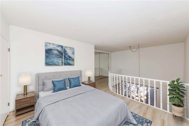 bedroom featuring light hardwood / wood-style floors