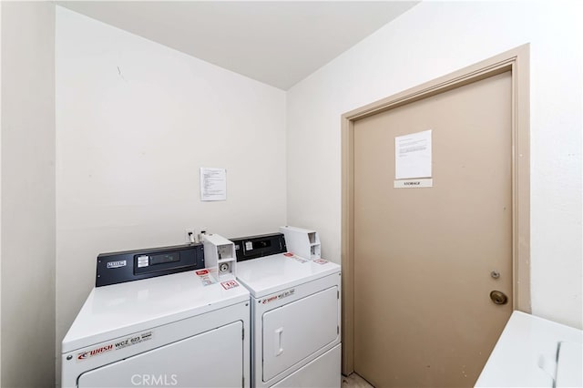 laundry room with washer and dryer