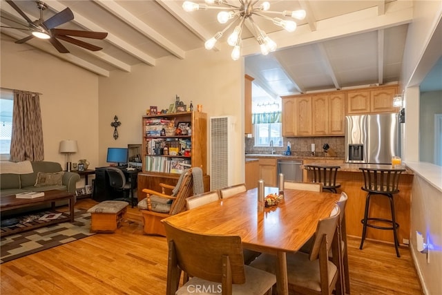 13503 Fidler Ave, Bellflower, CA 90706 - dining area featuring light wood-style floors, a chandelier, ceiling fan, and a heating unit