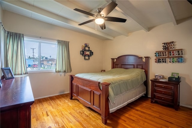 13503 Fidler Ave, Bellflower, CA 90706 - bedroom featuring beamed ceiling, light wood-style flooring, and ceiling fan