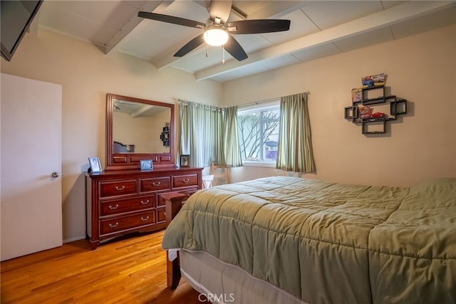 13503 Fidler Ave, Bellflower, CA 90706 - bedroom featuring beamed ceiling, light wood-style flooring, and a ceiling fan