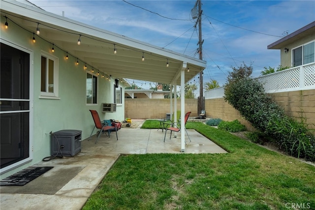 13503 Fidler Ave, Bellflower, CA 90706 - fenced backyard featuring a patio area