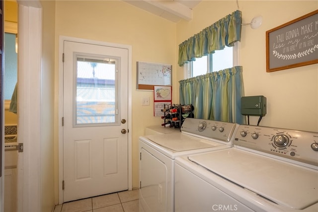 13503 Fidler Ave, Bellflower, CA 90706 - washroom featuring washing machine and dryer and light tile patterned floors