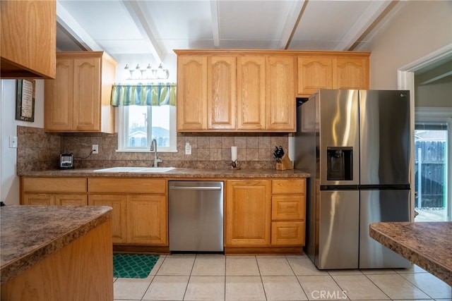 13503 Fidler Ave, Bellflower, CA 90706 - kitchen with stainless steel appliances, decorative backsplash, healthy amount of natural light, and beamed ceiling