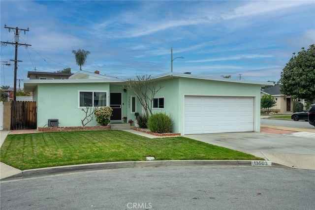 13503 Fidler Ave, Bellflower, CA 90706 - ranch-style home with stucco siding, driveway, and a garage
