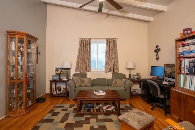 13503 Fidler Ave, Bellflower, CA 90706 - living area with a ceiling fan, a desk, wood finished floors, and beamed ceiling
