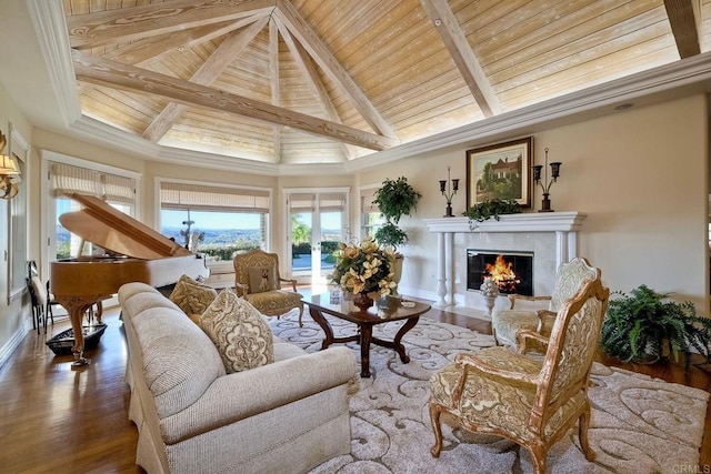 interior space with french doors, lofted ceiling with beams, wooden ceiling, and a premium fireplace