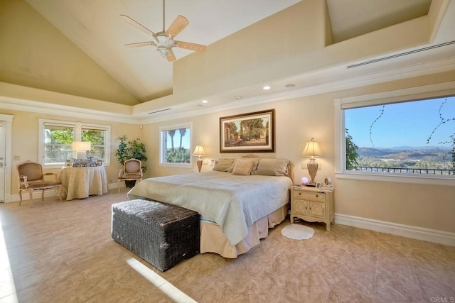 bedroom with ceiling fan and high vaulted ceiling